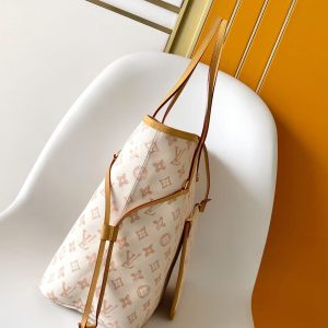 Alternative view of This spacious Neverfull MM in p620 is part of the Nautical Capsule, featuring vibrant LV and Monogram Blossoms. Sixty-six multicolored threads interwoven in subtle gradient hues create the jacquard pattern. A mirrored charm with engraving attaches to the long shoulder strap. Inside lies a matching removable zippered pocket. Dimensions: 31 x 28 x 14 cm.